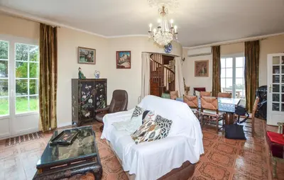 Coin salon dans l'établissement Belle Maison Au Bord De La Mer