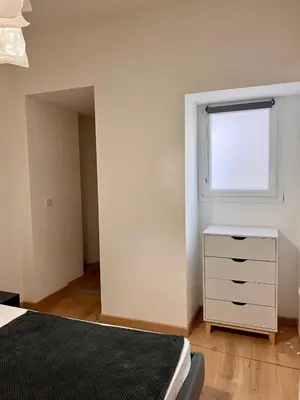Un ou plusieurs lits dans un hébergement de l'établissement Village centre appartement