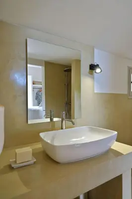 Salle de bains dans l'établissement Holiday Home Domaine Punta della Guardia Maison A Figa mit Blick auf das Meer by Interhome