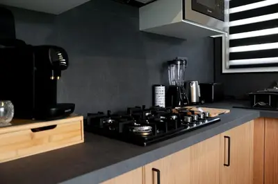 Cuisine ou kitchenette dans l'établissement Appartement entre mer et montagne