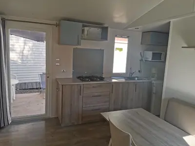 Cuisine ou kitchenette dans l'établissement Village Camping de l'Ostriconi 3 étoiles