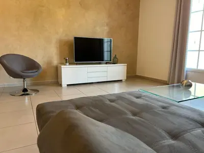 Télévision ou salle de divertissement dans l'établissement A Murella - maison de vacances à Oletta en Corse