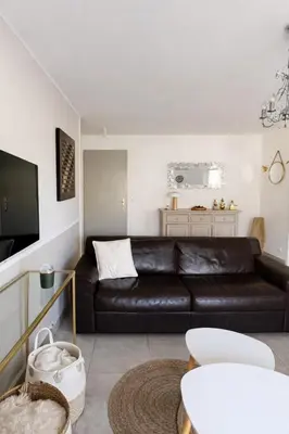 Coin salon dans l'établissement Appart cosy - Lumineux avec terrasse