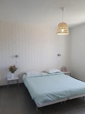 Un ou plusieurs lits dans un hébergement de l'établissement maison être mer et montagne