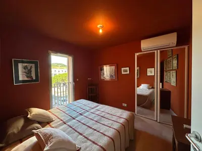 Un ou plusieurs lits dans un hébergement de l'établissement Appartement 3 pièces 6 couchages CALVI
