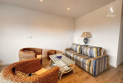 Coin salon dans l'établissement L'Alivu Apprt 2 chambres