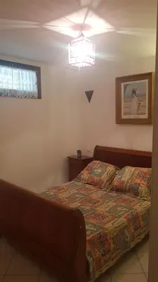 Un ou plusieurs lits dans un hébergement de l'établissement Bas de Villa chez Mr.Girolami Dominique