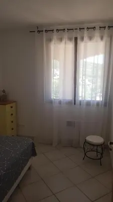 Un ou plusieurs lits dans un hébergement de l'établissement Bas de Villa chez Mr.Girolami Dominique