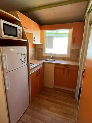 Cuisine ou kitchenette dans l'établissement Le Camping de la Plage