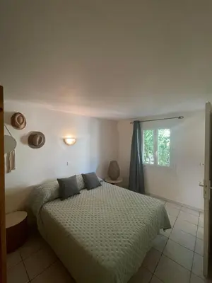 Un ou plusieurs lits dans un hébergement de l'établissement Camping la Clé des Champs
