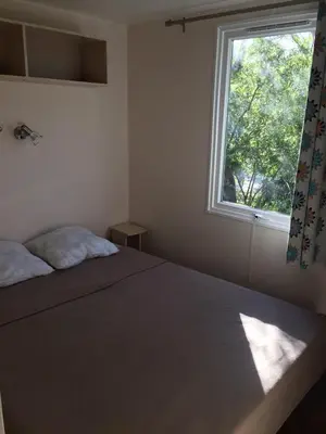 Un ou plusieurs lits dans un hébergement de l'établissement Camping Via Romana
