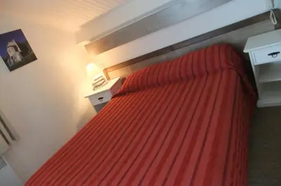 Un ou plusieurs lits dans un hébergement de l'établissement Hôtel U Pozzu