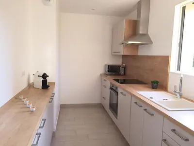 Cuisine ou kitchenette dans l'établissement Résidence San Pancraziu