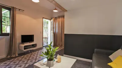 Télévision ou salle de divertissement dans l'établissement Laniella location
