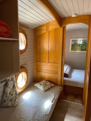 Un ou plusieurs lits dans un hébergement de l'établissement Camping Les Oliviers