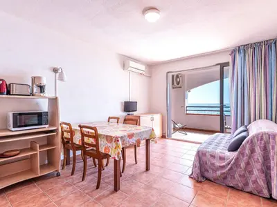 Un ou plusieurs lits dans un hébergement de l'établissement Apartment Casa Vecchi by Interhome