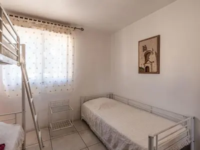 Un ou plusieurs lits dans un hébergement de l'établissement Villa Gelormini-1 by Interhome
