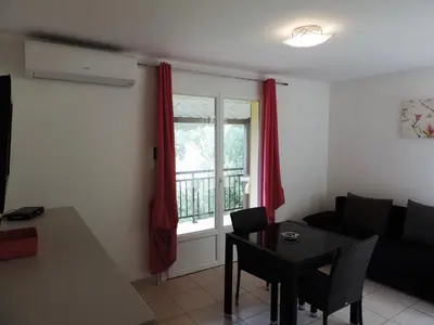 Coin salon dans l'établissement Apartment Camelia- Marjolène by Interhome