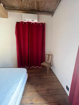 Un ou plusieurs lits dans un hébergement de l'établissement Appartement L'Ile-Rousse