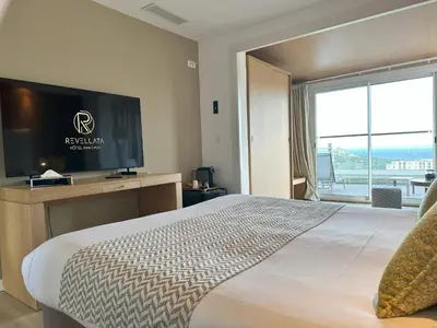 Un ou plusieurs lits dans un hébergement de l'établissement Hotel Revellata & Spa