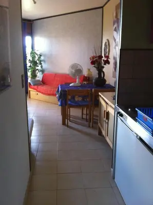 Cuisine ou kitchenette dans l'établissement Studio les pieds dans l'eau