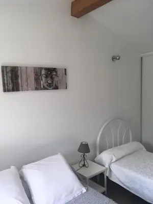 Un ou plusieurs lits dans un hébergement de l'établissement Villa Mer Et Montagne