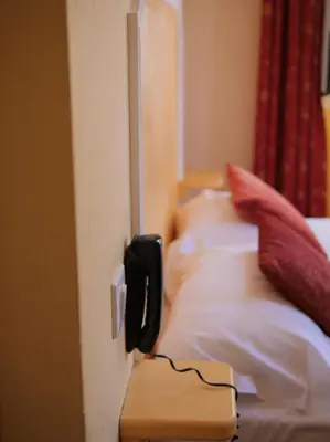 Un ou plusieurs lits dans un hébergement de l'établissement Hôtel de charme U Palazzu & Spa au coeur de Venacu