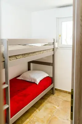 Un ou plusieurs lits dans un hébergement de l'établissement Apartment A Suara di Mare by Interhome