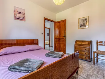 Un ou plusieurs lits dans un hébergement de l'établissement Apartment Casa Antoinette by Interhome