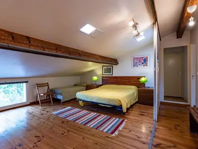 Un ou plusieurs lits dans un hébergement de l'établissement Apartment Villa Volpajola by Interhome
