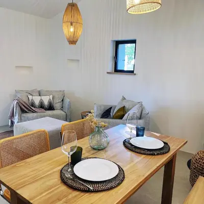 Coin salon dans l'établissement Les Villas Verroust