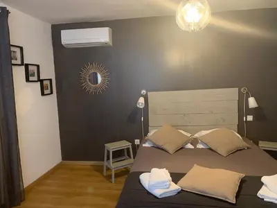 Un ou plusieurs lits dans un hébergement de l'établissement Hôtel U Passa Tempu