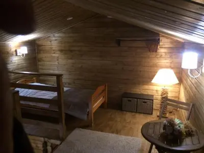 Un ou plusieurs lits dans un hébergement de l'établissement Gîtes les Chalets Vezzani Spa