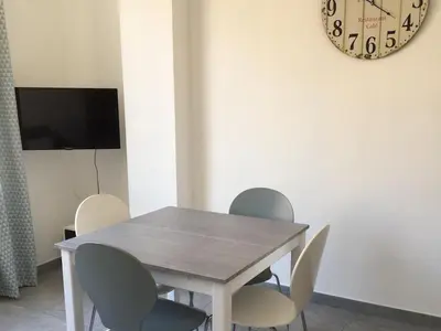 Télévision ou salle de divertissement dans l'établissement APPARTEMENT ERNELLA