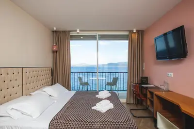 Un ou plusieurs lits dans un hébergement de l'établissement Hotel La Pietra Restaurant & Spa