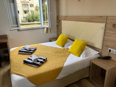 Un ou plusieurs lits dans un hébergement de l'établissement Hotel Bellevue