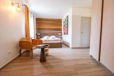 Un ou plusieurs lits dans un hébergement de l'établissement Hôtel & Restaurant Les Mouettes