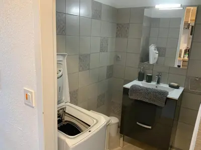 Cuisine ou kitchenette dans l'établissement Studio Bord De Mer