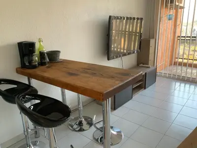 Télévision ou salle de divertissement dans l'établissement Studio Bord De Mer
