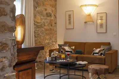 Coin salon dans l'établissement Hôtel La Dimora & Spa