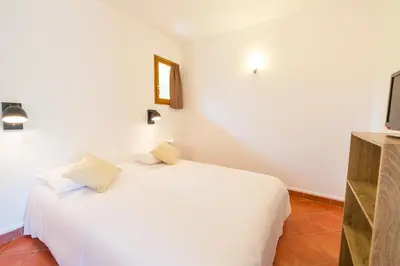 Un ou plusieurs lits dans un hébergement de l'établissement Casa Vecchia rooms + apartments