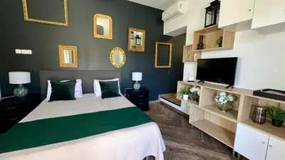 Un ou plusieurs lits dans un hébergement de l'établissement Appartement chic proche de la mer