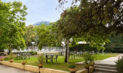 Jardin de l'établissement Appart Hotel Corte HR