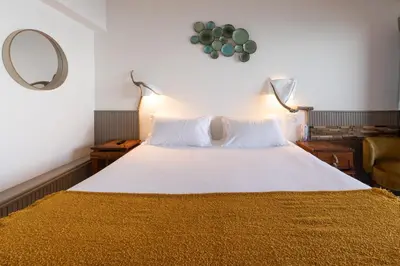 Un ou plusieurs lits dans un hébergement de l'établissement Hôtel Dolce Notte