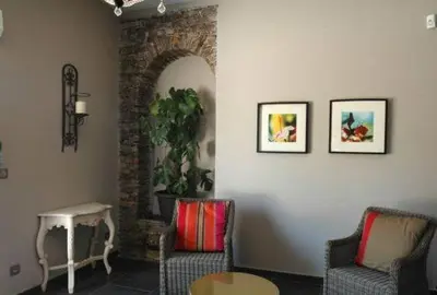 Coin salon dans l'établissement Hôtel la Palma