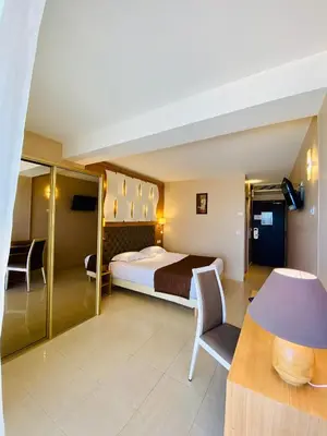 Un ou plusieurs lits dans un hébergement de l'établissement Hotel Tettola