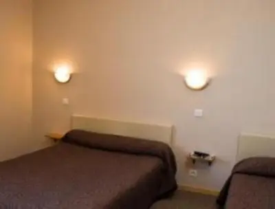 Coin salon dans l'établissement Les Orangers