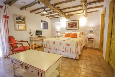 Un ou plusieurs lits dans un hébergement de l'établissement Latu Corsu - Côté Corse - Gites et chambres d'hôtes au Cap Corse