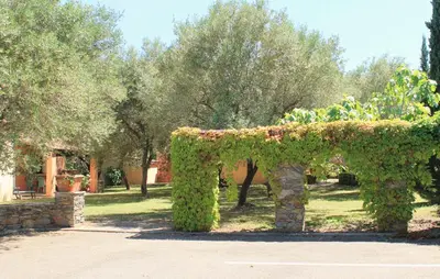 Jardin de l'établissement Chambres d'hôtes Le Clos des Oliviers