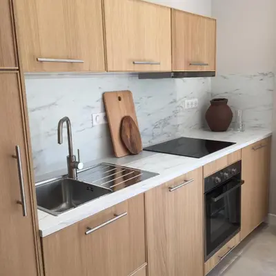 Cuisine ou kitchenette dans l'établissement L'Aiglon